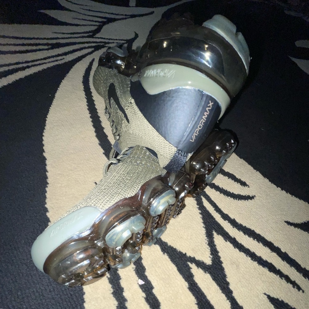 Nike, 8.5 mens size. Women’s 10 Army green.